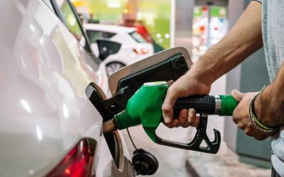 Filling up on gas at pump.